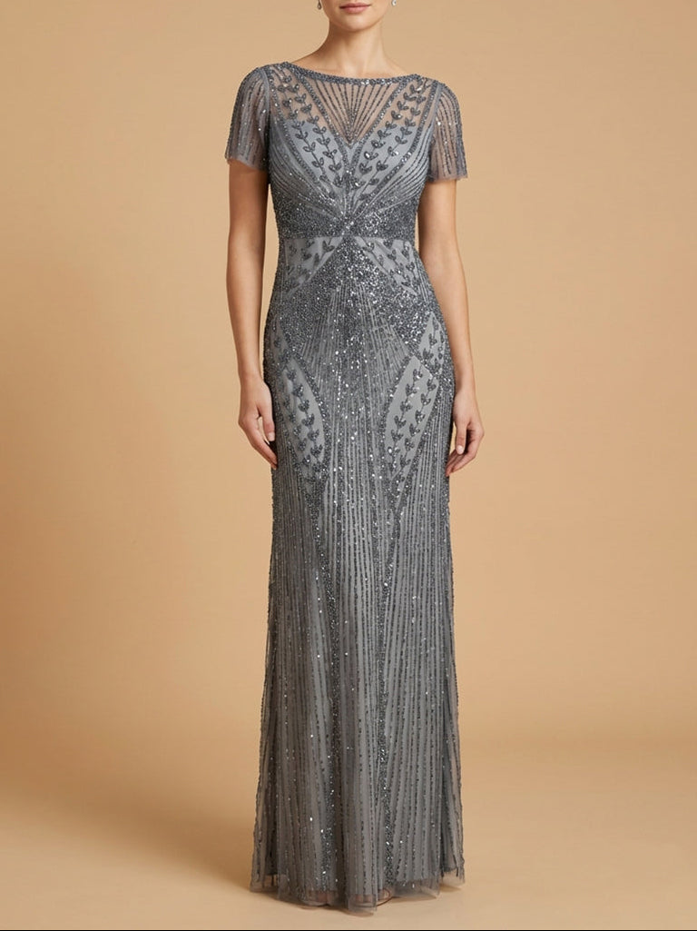 Elegant silver evening gown on a beige background